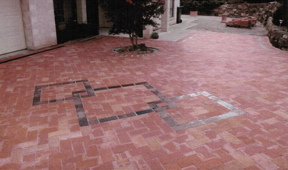 Old Red Pavers With Mahogany Pavers Pattern On Driveway